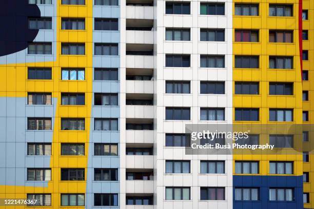colorful facade of renovated social housing project in the east side of berlin, germany - berlin modernism housing estates stock pictures, royalty-free photos & images