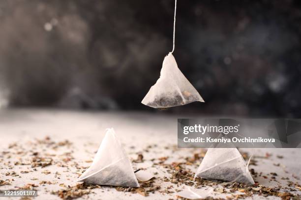 tea bag - herbal tea bag stock pictures, royalty-free photos & images