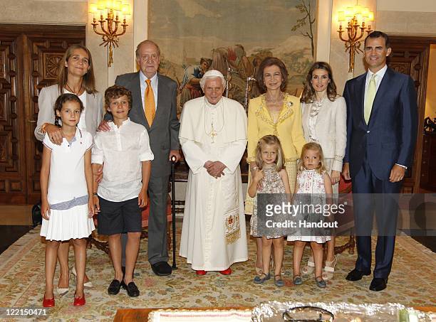 In this handout photo provided by the Royal Press Department, Pope Benedict XVI poses with Spanish Royal Family Princess Elena of Spain, King Juan...