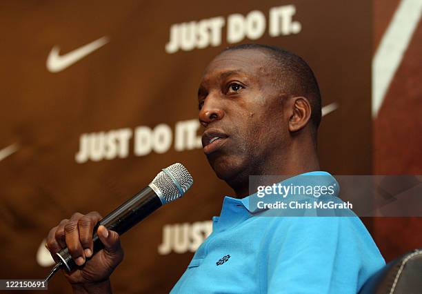 Olympic gold medalist Michael Johnson of the United States interviews sprinter Oscar Pistorius of South Africa during a media gathering at the...