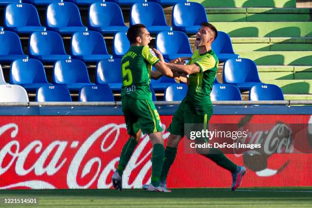 Charles Dias de Oliveira of SD Eibar celebrates after scoring his team's first goal with teammates during the Liga match between Getafe CF and SD...