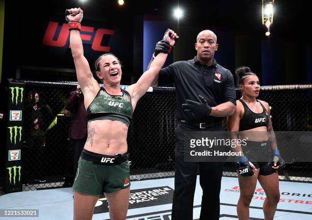 In this handout image provided by UFC, Tecia Torres reacts after her victory over Brianna Van Buren in their strawweight bout during the UFC Fight...