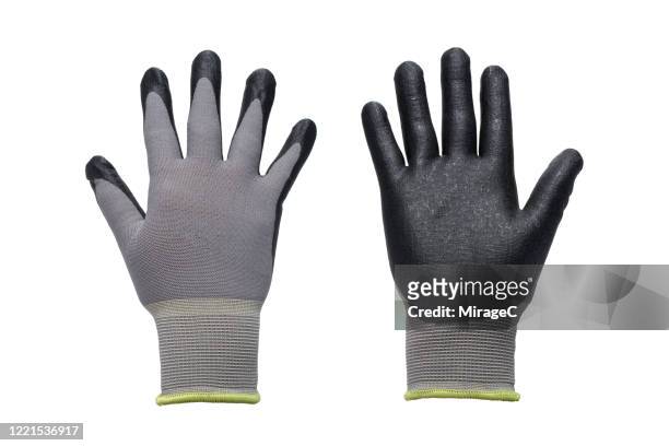 both sides of gray work gloves - tuinhandschoen stockfoto's en -beelden