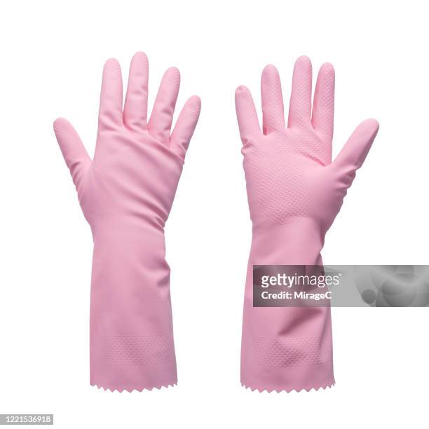 both sides of pink cleaning gloves - spülhandschuh stock-fotos und bilder