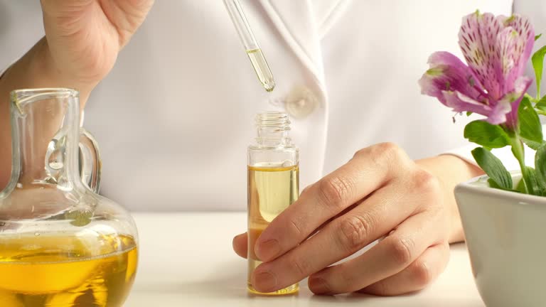 https://media.gettyimages.com/id/1221536923/video/essential-oil-made-in-the-laboratory-for-natural-organic-skincare-cosmetic-aromatherapy.jpg?b=1&s=640x640&k=20&c=d90Ic98WejI1085vZdj2iVlkbk9_8GsI7LW2ZRZzjrI=