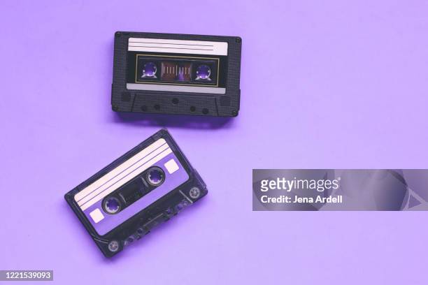 two vintage cassette tapes, mix tapes, 80s 90s life - cassette stock pictures, royalty-free photos & images