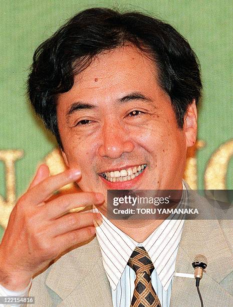 Naoto Kan, leader of the main opposition Democratic Party, gestures during a press conference at the Japan National Press Club in Tokyo 22 June. The...