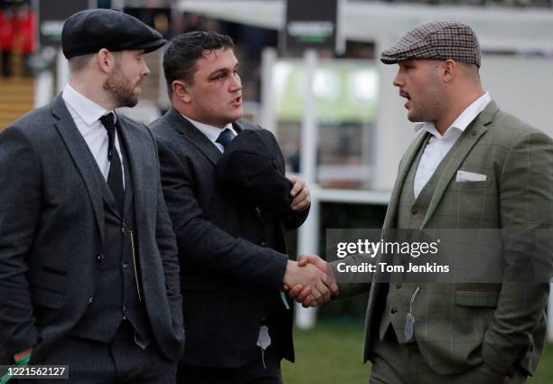 England rugby players l-r Elliot Daly, Jamie George, Ellis Genge during day one of the Cheltenham National Hunt Racing Festival at Cheltenham...