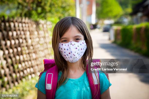 little girl wearing self-made mask - cloth face mask foto e immagini stock