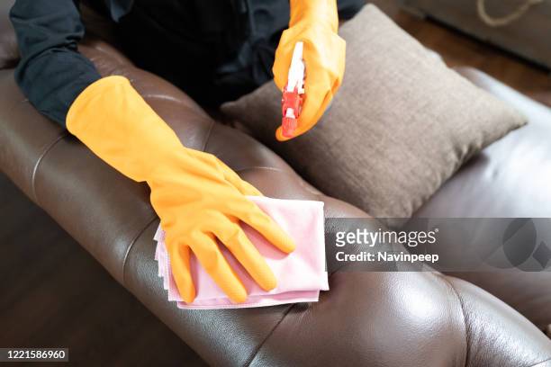 cleaning leather chair - leather couch stock pictures, royalty-free photos & images