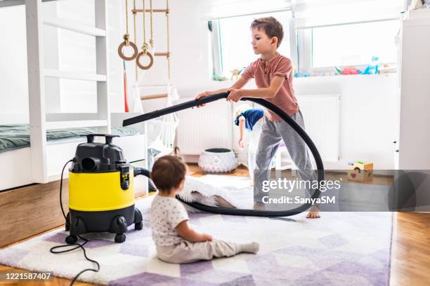 Children Clean Roo Child Cleaning Bedroom Photos and Premium High Res Pictures - Getty Images