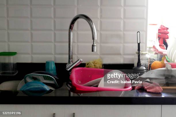 messy kitchen sink - dirty sink stock pictures, royalty-free photos & images