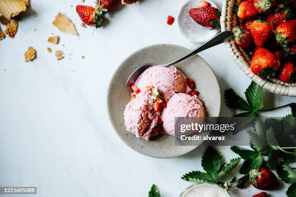 tasty strawberry ice-cream - ice cream waffle bowls stock pictures, royalty-free photos & images