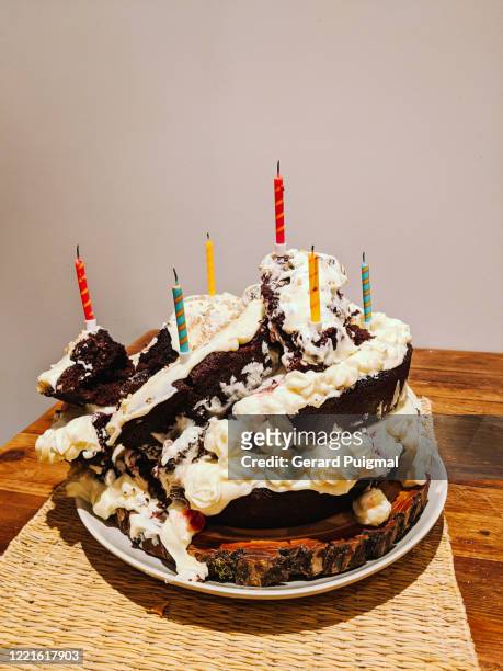 birthday chocolate cake that fell apart - fall party inside stock-fotos und bilder