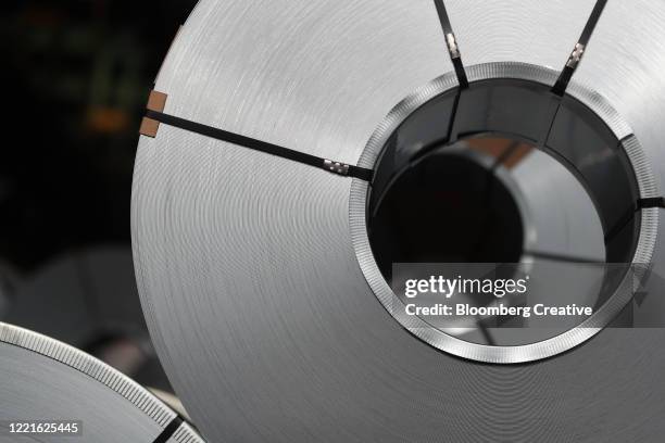 rolls of steel sheet - spool stock pictures, royalty-free photos & images