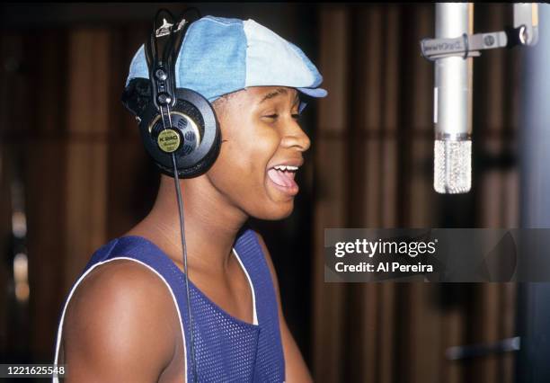 Musician Usher records vocals for the Black Men United song "U Will Know" on July 26, 1994 in New York City.