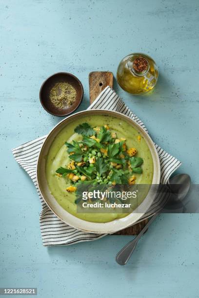 spinach and green pea soup with grilled corn - soup stock pictures, royalty-free photos & images