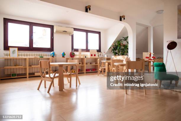 bright preschool classroom - nursery school building stock pictures, royalty-free photos & images
