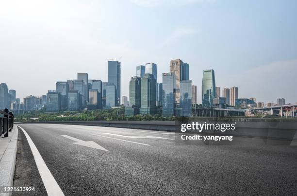 air highway asphalt road and office building of commercial build - city road stock pictures, royalty-free photos & images