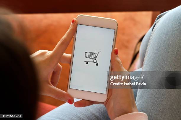 woman shopping online - shopping screen stock-fotos und bilder