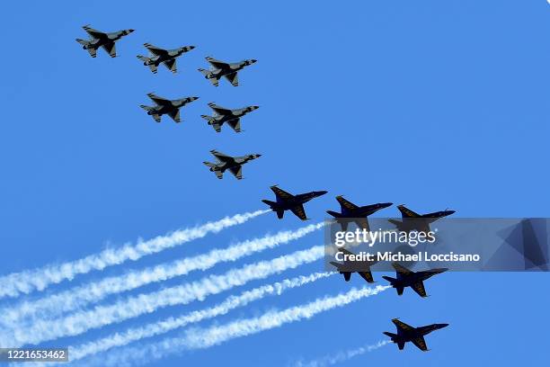 The U.S. Navy's Blue Angels and U.S. Air Force's Thunderbirds perform a flyover tribute to honor NYC COVID-19 frontline workers on April 28, 2020 as...