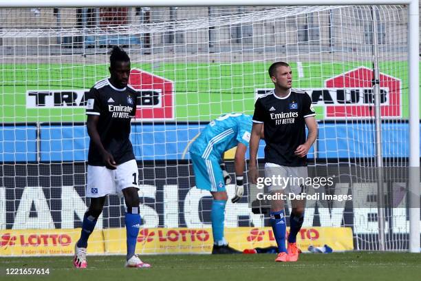 Bakery Jatta of Hamburger SV and Louis Beyer of Hamburger SV looks dejected during the Second Bundesliga match between 1. FC Heidenheim 1846 and...