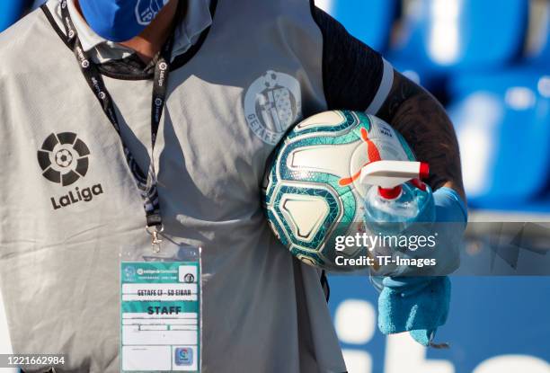 Official matchball and a disinfection bottle are seen during the Liga match between Getafe CF and SD Eibar SAD at Coliseum Alfonso Perez on June 20,...