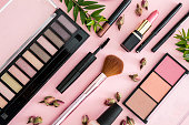 Make up cosmetics products against pink color background