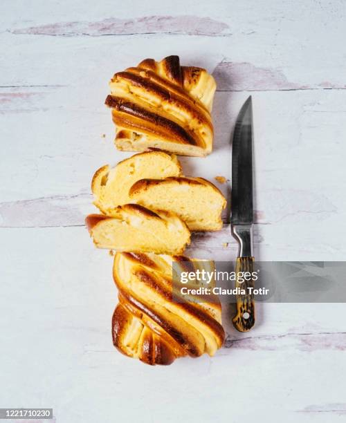 brioche cream cheese swirl in wooden, white background - bollo dulce fotografías e imágenes de stock