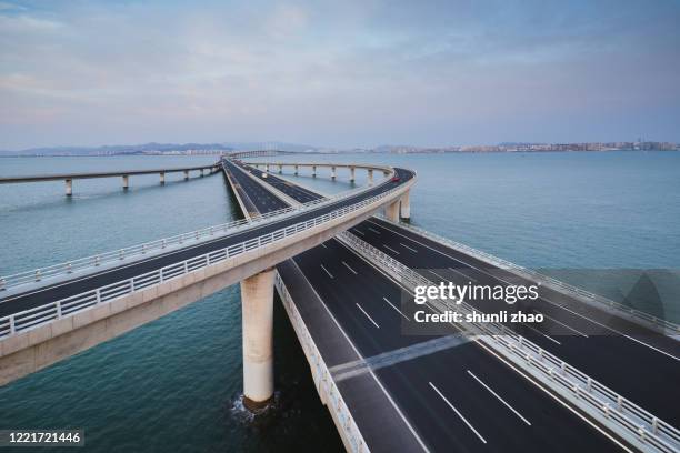 qingdao jiaozhou bay cross-sea bridge - shandong province stock pictures, royalty-free photos & images