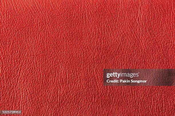 close up red leather and texture background. - leather stock-fotos und bilder