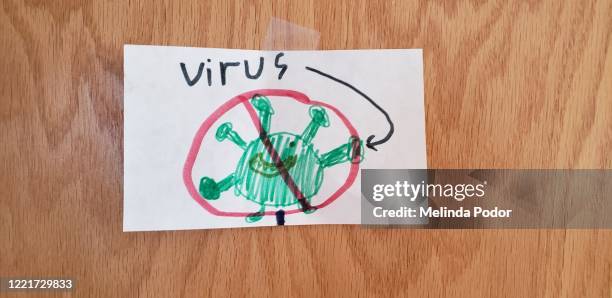 child's drawing of virus, crossed out with red line - keep out sign foto e immagini stock