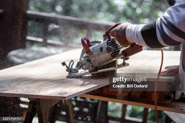 Man Using Saw Man With Circular Saw Photos and Premium High Res Pictures - Getty Images
