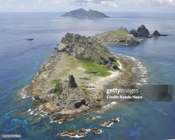 File photo taken in September 2012 shows the Japan-controlled Senkaku Islands in the East China Sea. Taiwan and China claim the uninhabited islands...