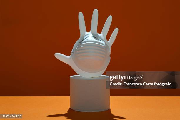 concept of protection and prevention from coronavirus - surgical glove balloon stock pictures, royalty-free photos & images