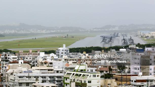 Photo shows U.S. Marine Corps Air Station Futenma in Ginowan in Japan's southern island prefecture of Okinawa on June 22 a day before the 60th...