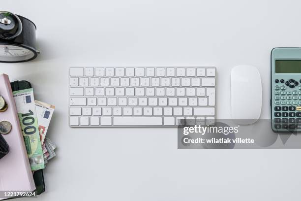 wood office desk table with computer top view with copy space, flat lay. - computertastatur stock-fotos und bilder