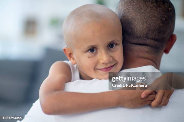 young oncology patient in hospital. - childhood cancer stock pictures, royalty-free photos & images