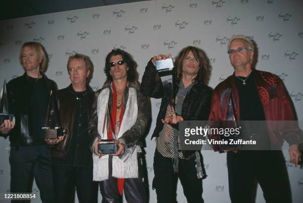 American rock band Aerosmith attend the 2001 American Music Awards, held at the Shrine Auditorium in Los Angeles, California, 8th January 2001.