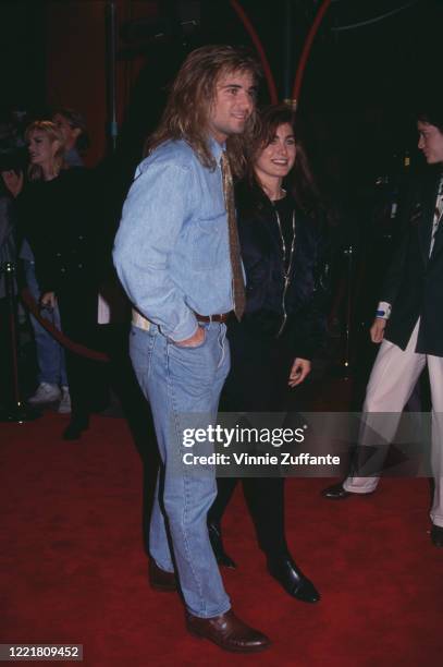 American tennis player Andre Agassi and his girlfriend Wendi Stewart attend the premiere of 'The Bodyguard', held at Mann's Chinese Theatre in Los...