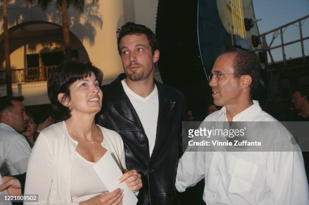 Marilyn Katzenberg, American actor Ben Affleck, and Katzenberg's husband, American film producer Jeffrey Katzenberg attend the premiere of 'American...