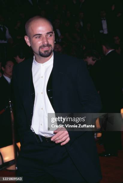 American tennis player Andre Agassi attends the 1997 American Comedy Awards, held at the Shrine Auditorium in Los Angeles, California, 9th February...