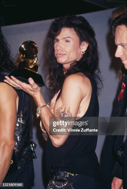 American singer Steven Tyler, frontman with rock band Aerosmith, attends the 1994 Grammy Awards, held at Radio City Music Hall in New York City, New...
