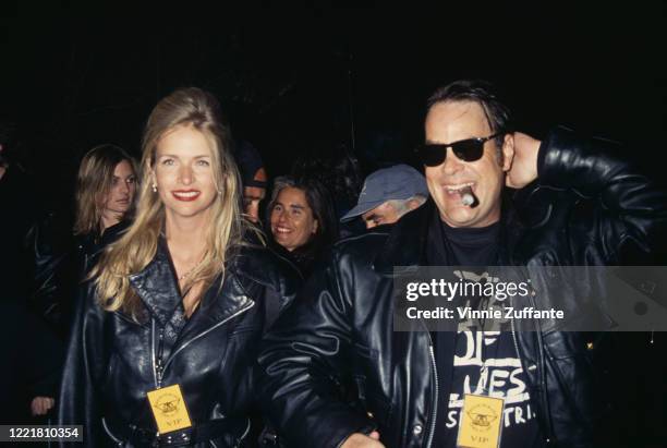 American actress Donna Dixon and her husband, Canadian actor and comedian Dan Aykroyd attend the opening of The House of Blues in Los Angeles,...