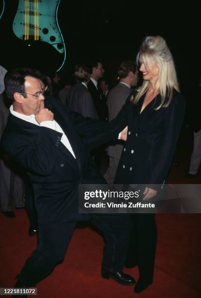 Canadian actor and comedian Dan Aykroyd and his wife, American actress Donna Dixon attend the premiere of 'Sgt Bilko', held at the Cinerama Dome...