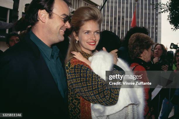 Canadian actor and comedian Dan Aykroyd and his wife, American actress Donna Dixon, with their daughter Danielle Aykroyd, attend the premiere of...