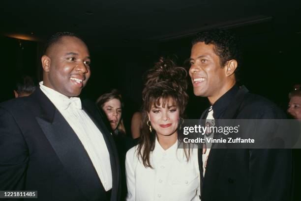 America singer Freddie Jackson, American singer and dancer Paula Abdul, and American singer Gregory Abbott attend the National Academy of Popular...