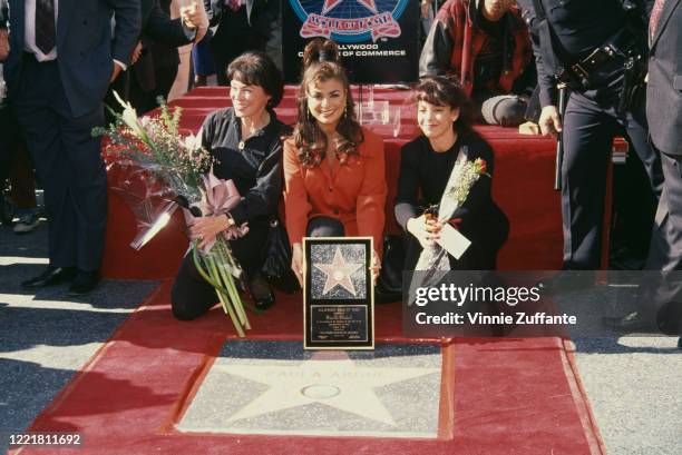 American singer and dancer Paula Abdul , with her mother, Canadian pianist Lorraine Rykiss , and sister, Wendy Mandel, during Abdul's Hollywood Walk...