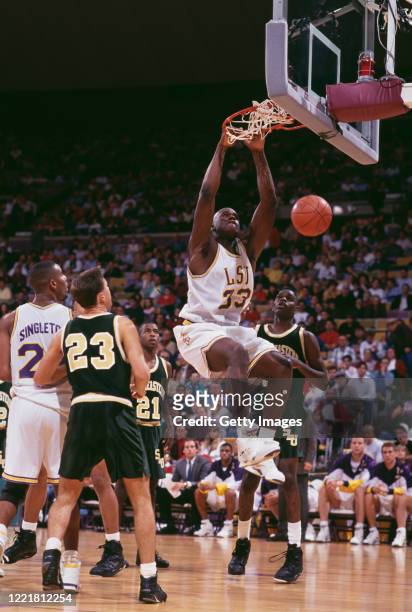 Shaquille O'Neal, Center for the Louisiana State University Fighting Tigers dunks the ball through the hoop during the NCAA Southeastern Conference...