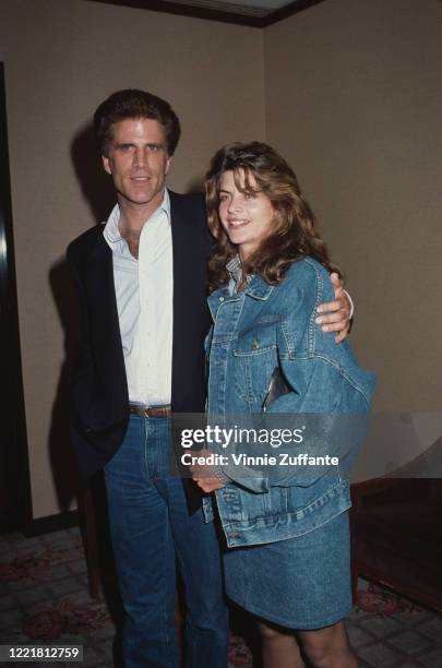 American actor Ted Danson and American actress Kirstie Alley, wearing a denim jacket and skirt, at an NBC promotional event in Los Angeles,...